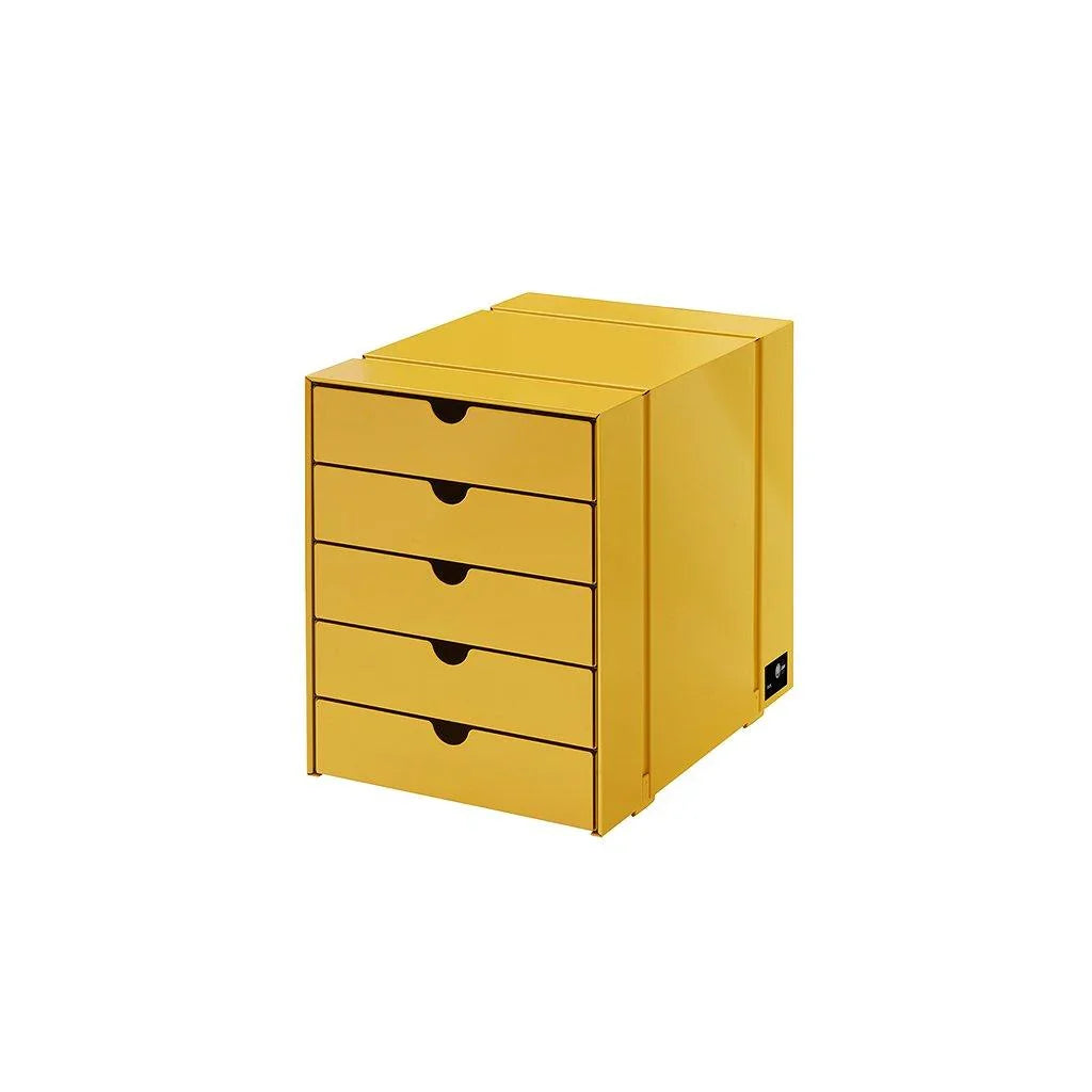 USM Haller Schubladenelement Inos K1 in leuchtendem Goldgelb – frischer Farbtupfer mit ikonischem Design für moderne Arbeitsräume