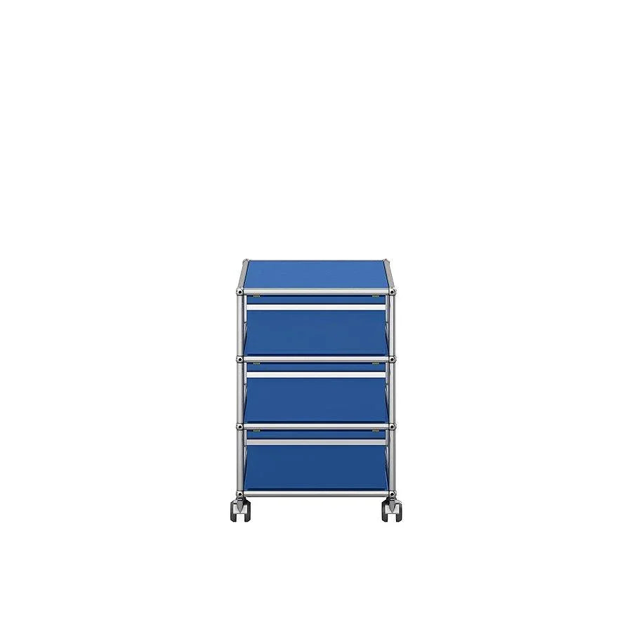 USM Rollcontainer M26 in Enzianblau – kreatives Möbelstück für designorientierte Arbeitsplätze mit strukturiertem Stauraum und Stil