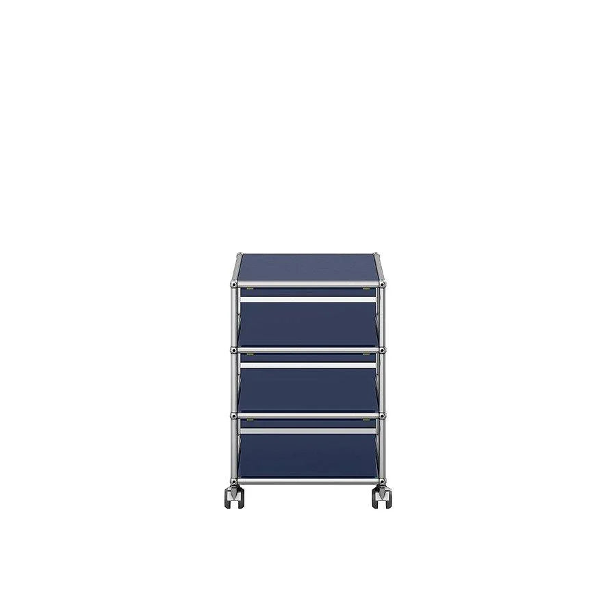 Design-Rollcontainer M26 von USM Haller in Stahlblau – farbiger Akzent für moderne Bürolösungen mit architektonischer Klarheit