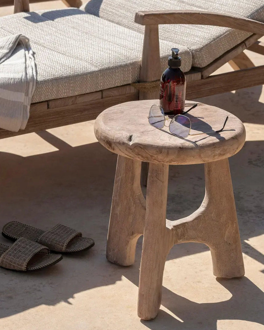 LAYA Side table by Gommaire in an outdoor scene - ideal as a shelf next to a lounge chair or sofa