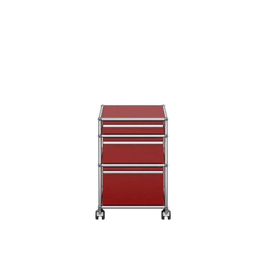 USM Haller Rollcontainer M63 in kräftigem Rubinrot – stilvolles Möbelstück für charaktervolle Büros, Studios oder Design-Enthusiasten